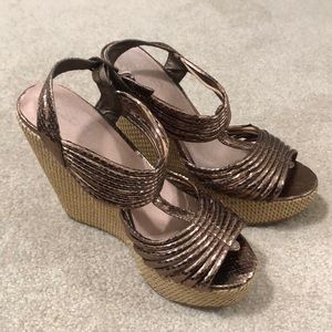 Cute used Aldo wedges! Metallic bronze color.